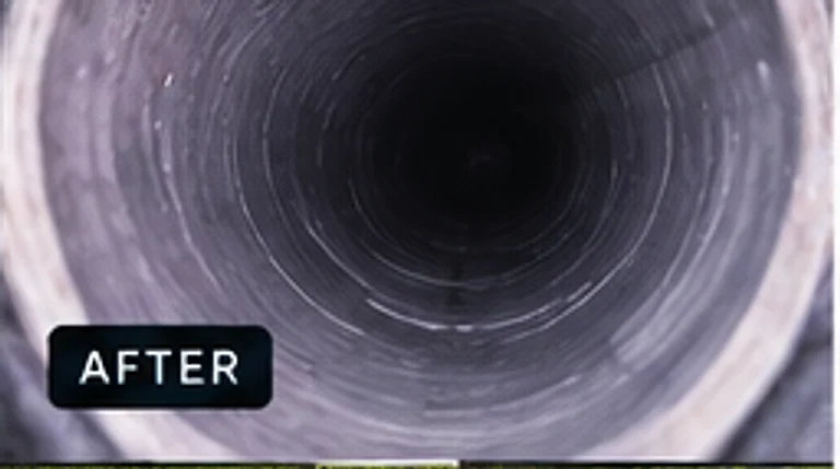View along the inside of a drain pipe with a clean, unobstructed bore after high-pressure jetting